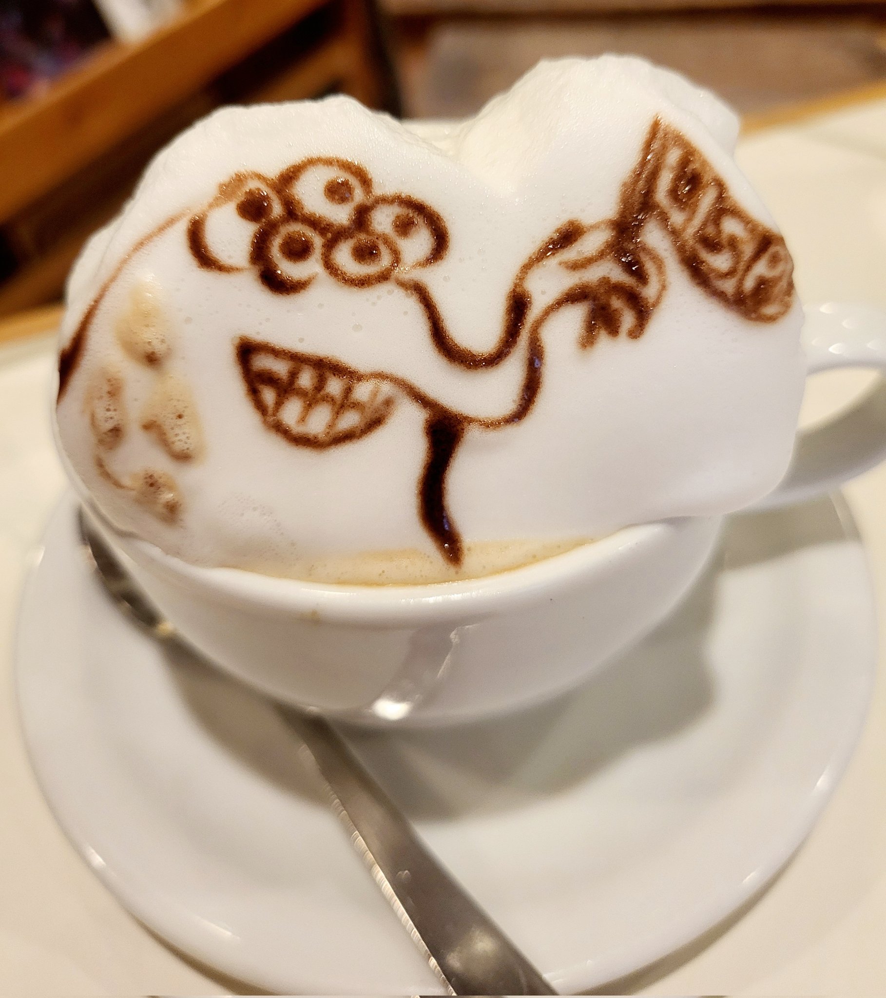 alien tech lisp logo latte art 2024